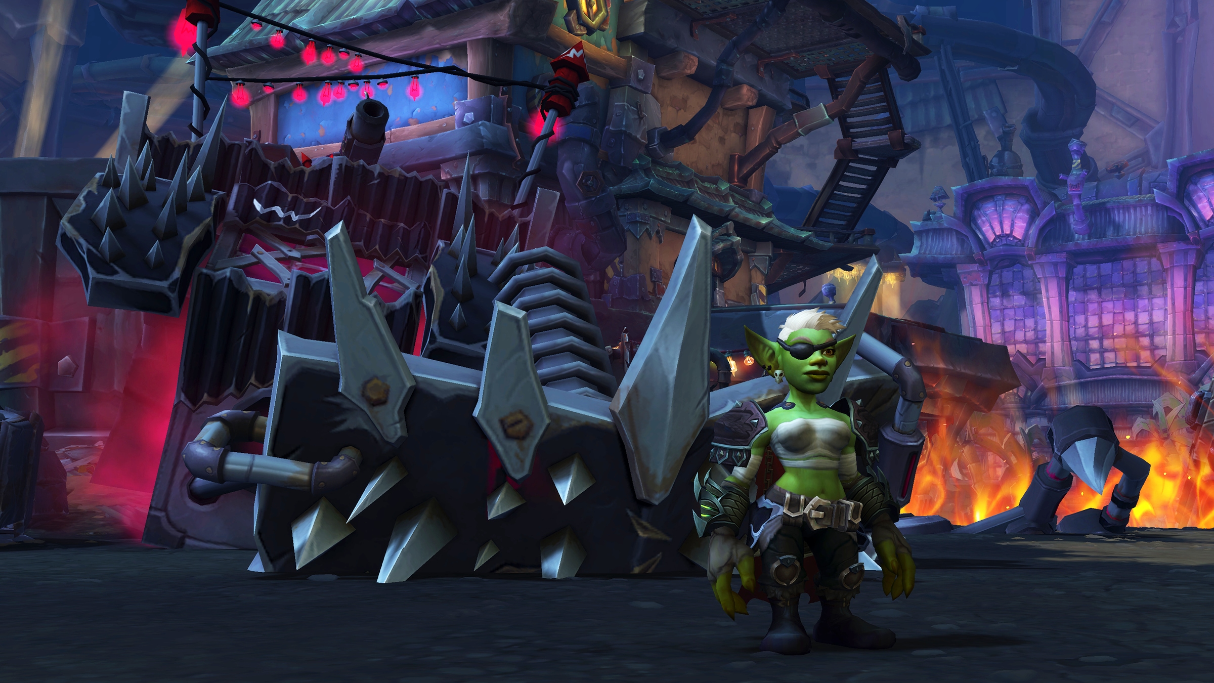 A green-skinned goblin stands confidently in front of a large, menacing mechanical contraption with spikes, set against a vibrant and chaotic backdrop that suggests a bustling and industrial environment.
